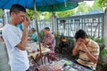 Unidentified Thai Buddhism inspects on buddha amulets