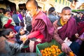 Unidentified tibetan Buddhist monks near stupa Boudhanath during festive Puja of H.H. Drubwang Padma Norbu Rinpoche's reincarnati
