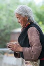 An unidentified Tibetan pilgrim prays