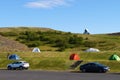 Unidentified tourist going out of tent near Lake Myvatn,Iceland