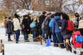 Unidentified tourist are waiting to see the most famous show at Otaru Sea Aquarium, The Penguins line up and walking on the snow Royalty Free Stock Photo