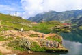 Unidentified tourists enjoy the sights of Balea Lake at 2,034 m altitude on July 21 Royalty Free Stock Photo