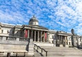 Unidentified tourists near National Gallery in Trafalgar Square, London . UK Royalty Free Stock Photo