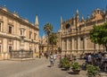 unidentified tourists in Plaza del Triunfo, Andalusia, Seville