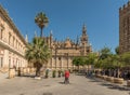 unidentified tourists in Plaza del Triunfo, Andalusia, Seville