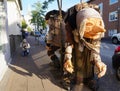 Unidentified tourists taking picture of Icelandic trolls on streets of Reykjavik downtown, Iceland Royalty Free Stock Photo