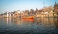 Tourists taking the popular boat tour on the sacred Ganges river in Varanasi, Utta