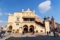 Unidentified tourists visiting main market square in Krakow, Poland Royalty Free Stock Photo