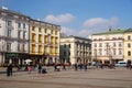 Unidentified tourists visiting main market square in Krakow, Poland Royalty Free Stock Photo