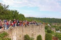 Unidentified tourists are waiting for festival of air balloons with a ballooning annual show in Kamianets-Podilskyi