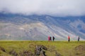 Unidentified tourists walking back from visit Gatklettur Stone A