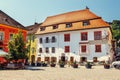 Unidentified tourists walking in historic town Sighisoara. City in which was born Vlad Tepes, Royalty Free Stock Photo