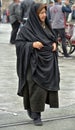 Unidentified Turkish women in traditional Islamic clothing on the streets of the city Royalty Free Stock Photo