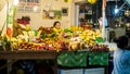 An unidentified vendor selling tropical, exotic fruit on the str