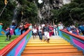 Unidentified visitors at colorful staircase at Murugan Temple Batu Caves, Malaysia Royalty Free Stock Photo