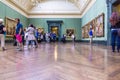 Unidentified visitors in one of the halls of the London National Gallery