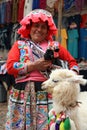 Unidentified Woman with Alpaca at the Market of Pisac in Peru