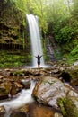 Unidentified Woman Standing at Mahua Waterfall