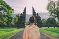 Woman at the traditional gate in Bali