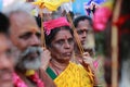 Women devotees carry scared pots in their heads and participates in the Thaipusam festival