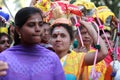 Women devotees carry scared pots in their heads and participates in the Thaipusam festival