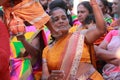 Women devotees dance while participate in the Thaipusam festival