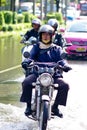 UNIDENTIFIED WOMEN RIDE THE MOTORBIKE