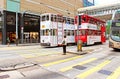 Unidentified women waiting to cross a busy street in Hong Kong Royalty Free Stock Photo