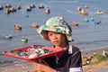 Unidentified young seller in Fishing village. Mui Ne. Vietnam