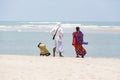 Unidentified young women girl couple taking a walk at beautiful sunny morning at Danushkodi beach