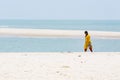 Unidentified young women girl couple taking a walk at beautiful sunny morning at Danushkodi beach