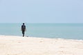 Unidentified young women girl couple taking a walk at beautiful sunny morning at Danushkodi beach