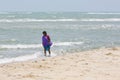 Unidentified young women girl couple taking a walk at beautiful sunny morning at Danushkodi beach