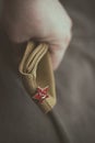 Uniform cap of a Soviet soldier of the WWII with a star. In memory of Victory Day on May 9th. Royalty Free Stock Photo