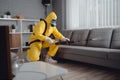 pesticide control exterminator termite cockroach uniform insect kill pest sofa. Generative AI.