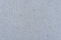 uniform light grey fine-grained stone or concrete surface texture, detailed abstract construction background, concept of Royalty Free Stock Photo