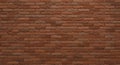 Uniform red brick wall with a classic horizontal alignment. The bricks are Royalty Free Stock Photo
