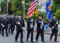 Uniformed firemen and officers and Cadets during parade march Royalty Free Stock Photo