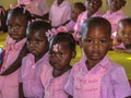 Uniformed in pink kindergartners in rural Haiti.