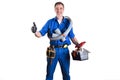 Uniformed plumber with work tools and  ok sign isolated background Royalty Free Stock Photo