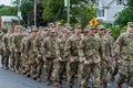 Uniformed soldiers in USA army all white men walk in formation