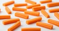 Uniformly cut carrot sticks are scattered Royalty Free Stock Photo