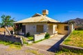 Uninhabitable One Level Home With Rusty Tin Roof Royalty Free Stock Photo