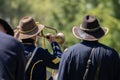 A union army soldier plays the trumpet during a Civil War reenactment