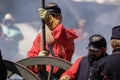 Union army soldiers by a cannon in a civil war reenactment