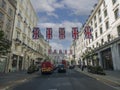 Union flags on display along Waterloo Place in London