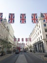 Union flags on display along Waterloo Place in London