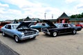 Pontiac GTO and Chevy Nova at Car Show Royalty Free Stock Photo