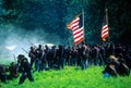 Union infantry line fires on advancing Confederates Royalty Free Stock Photo