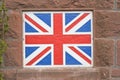 Union Jack flag painted on wall.